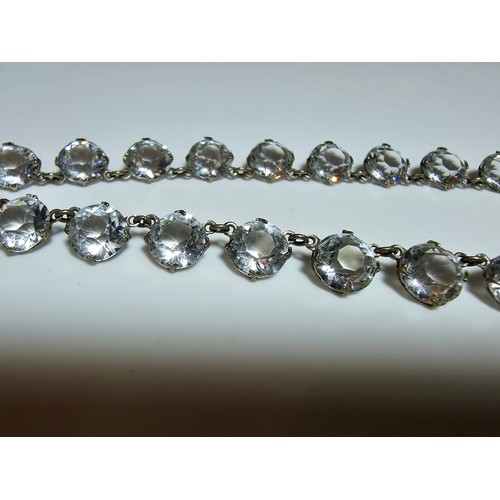 188 - A pretty necklace featuring faceted crystal glass stones all the way around, in good clean condition... 