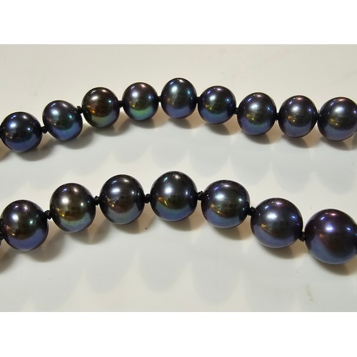 222 - Fine quality crown Jersey black pearl necklace and matching bracelet which are beautifully cultured.... 