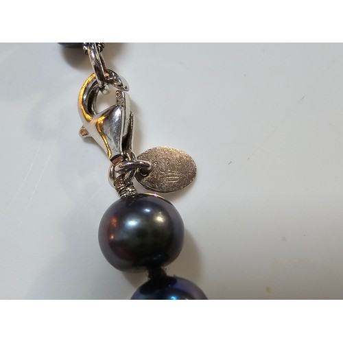 222 - Fine quality crown Jersey black pearl necklace and matching bracelet which are beautifully cultured.... 