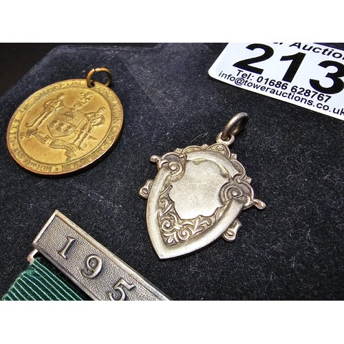 213 - A collection of 8x various medals to include 4 Sterling Silver medals, 3 of which are football relat... 