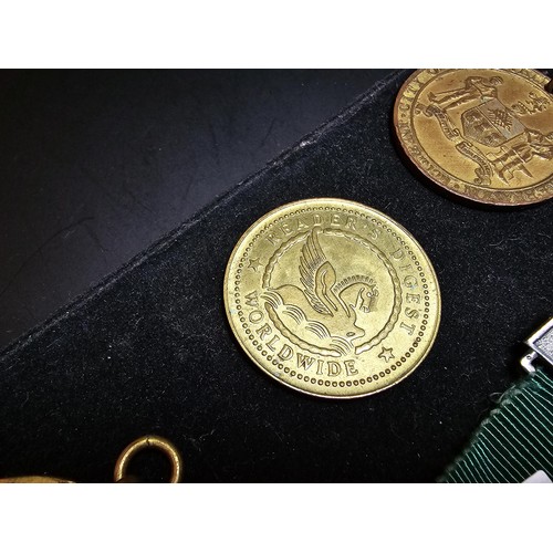 213 - A collection of 8x various medals to include 4 Sterling Silver medals, 3 of which are football relat... 