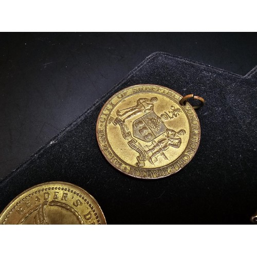 213 - A collection of 8x various medals to include 4 Sterling Silver medals, 3 of which are football relat... 