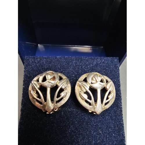 210 - A pair of pretty 925 silver clip on earrings in a Charles Rennie Mackintosh design, signed for Kit H... 