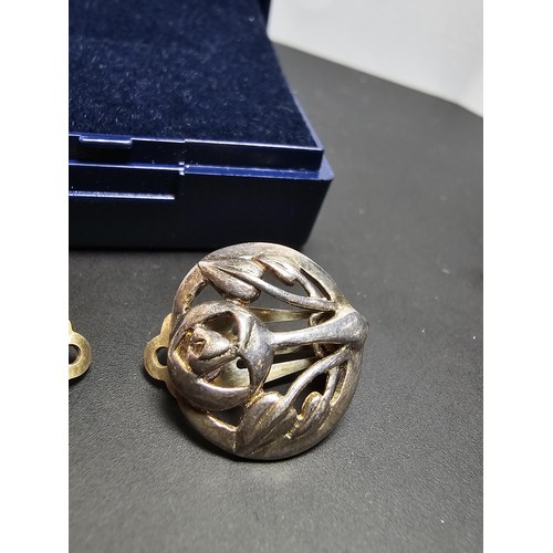 210 - A pair of pretty 925 silver clip on earrings in a Charles Rennie Mackintosh design, signed for Kit H... 