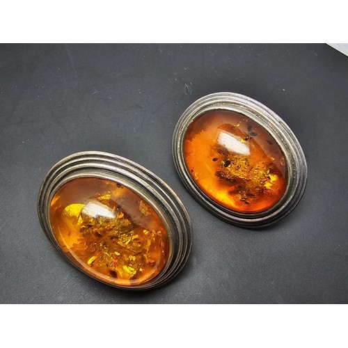 206 - A pair of large vintage 925 silver amber earrings inset with large natural Baltic amber cabochon sto... 