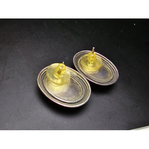 206 - A pair of large vintage 925 silver amber earrings inset with large natural Baltic amber cabochon sto... 