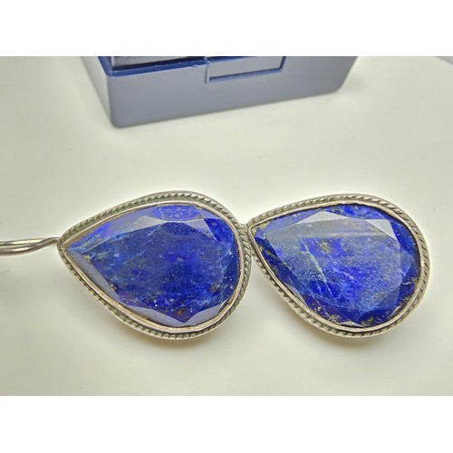 205 - A good large vintage par of sterling silver earrings inset with teardrop shaped faceted lapis lazuli... 