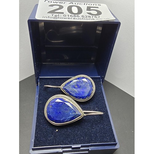 205 - A good large vintage par of sterling silver earrings inset with teardrop shaped faceted lapis lazuli... 