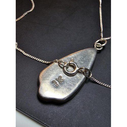 224 - A pretty 925 silver pendant inset with Abalone Shell presented in excellent flashing colours set on ... 