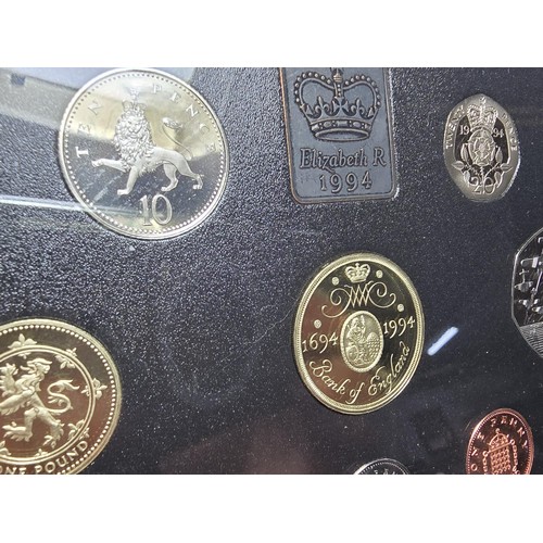 283 - An attractive Royal Mint 1994 red leather deluxe coin proof set featuring the £2 coin, the set displ... 