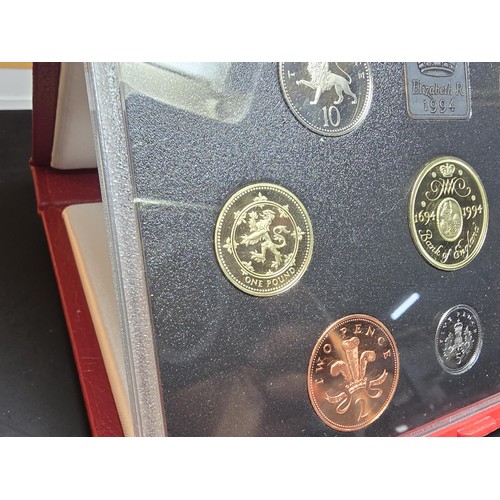 283 - An attractive Royal Mint 1994 red leather deluxe coin proof set featuring the £2 coin, the set displ... 