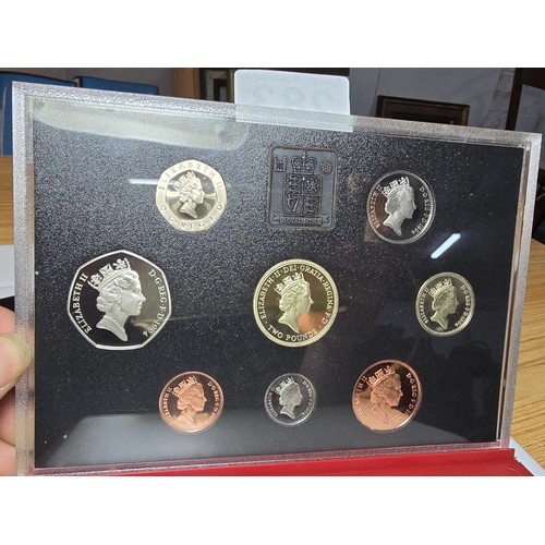 283 - An attractive Royal Mint 1994 red leather deluxe coin proof set featuring the £2 coin, the set displ... 