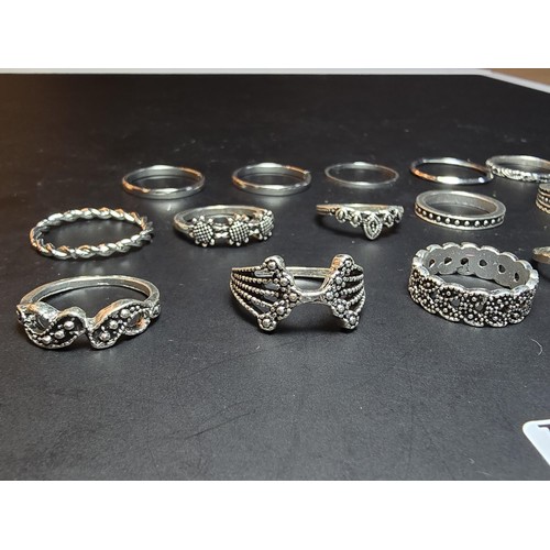 218 - A collection of 15x costume rings, some featuring ornate designs and all in as new condition.