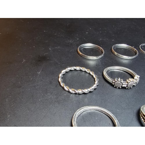 218 - A collection of 15x costume rings, some featuring ornate designs and all in as new condition.