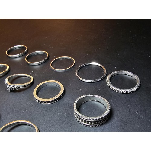 218 - A collection of 15x costume rings, some featuring ornate designs and all in as new condition.