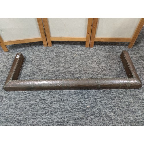 286 - Good quality antique copper fender with studded design in very good condition measures 110cm by 39cm