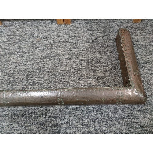 286 - Good quality antique copper fender with studded design in very good condition measures 110cm by 39cm