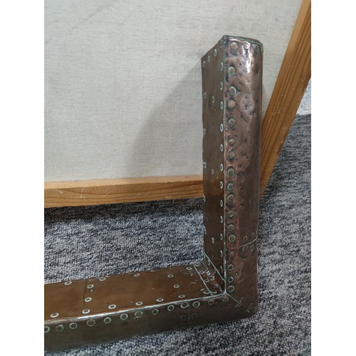 286 - Good quality antique copper fender with studded design in very good condition measures 110cm by 39cm