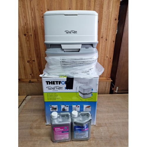 343A - An as new Thetford portapotti 165 ideal for caravens, etc. along with a new and sealed bottle of bow... 