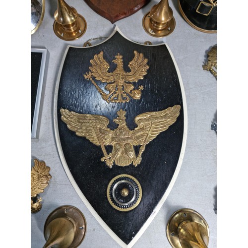 9 - A good collection of of Prussian military items inc a shield with a Prussian military Picklehaube br... 