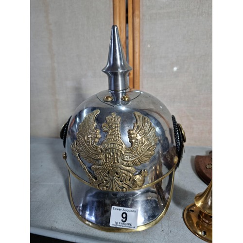 9 - A good collection of of Prussian military items inc a shield with a Prussian military Picklehaube br... 