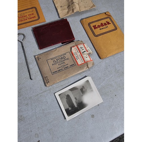 21 - Collection of vintage Kodak items inc a Kodak film developing tank, a boxed Kodak portrait attachmen... 