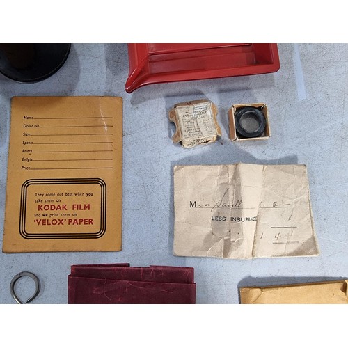 21 - Collection of vintage Kodak items inc a Kodak film developing tank, a boxed Kodak portrait attachmen... 