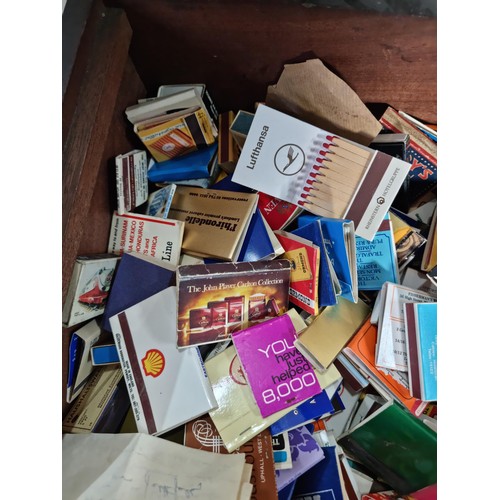 22 - Large wooden box containing a very large quantity of advertising matches inc Players, National Garde... 