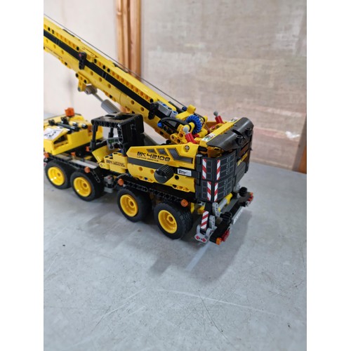 23 - Good quality well built Lego Technics GK 42108 mobile crane, with movable lifting arm, wind-up cord,... 