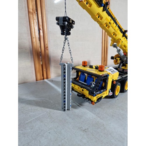 23 - Good quality well built Lego Technics GK 42108 mobile crane, with movable lifting arm, wind-up cord,... 