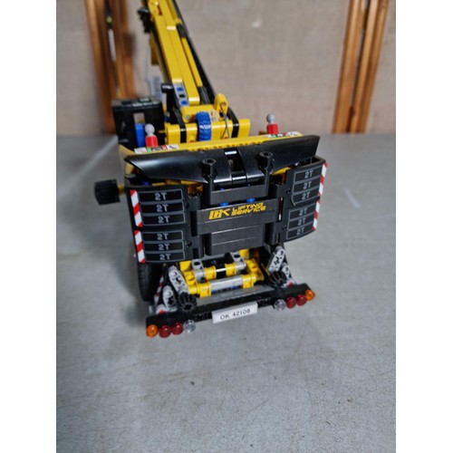 23 - Good quality well built Lego Technics GK 42108 mobile crane, with movable lifting arm, wind-up cord,... 