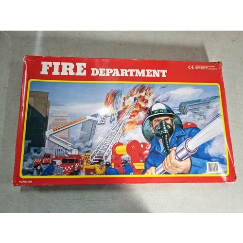 26 - A diecast model fire engine scene, vintage set, never been opened.