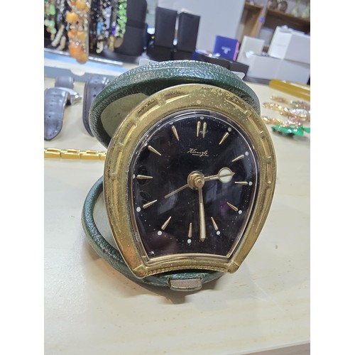 245 - A collection of 10 various watches and 12 travel clocks to include a good quality horseshoe formed t... 