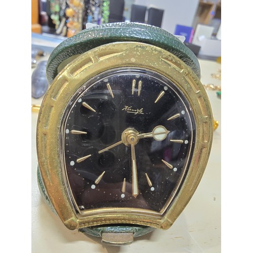 245 - A collection of 10 various watches and 12 travel clocks to include a good quality horseshoe formed t... 