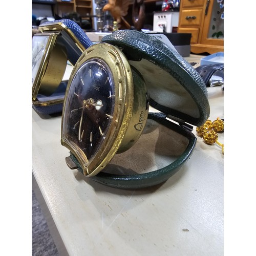 245 - A collection of 10 various watches and 12 travel clocks to include a good quality horseshoe formed t... 