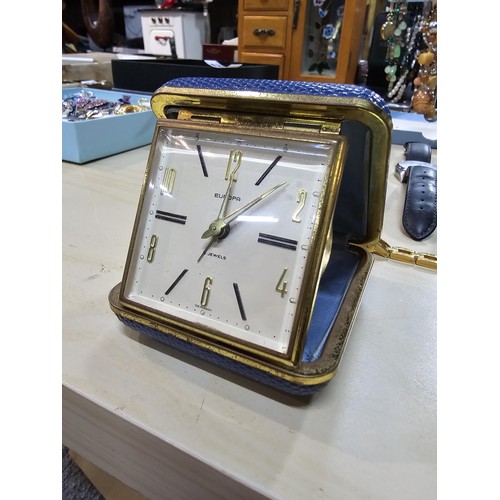 245 - A collection of 10 various watches and 12 travel clocks to include a good quality horseshoe formed t... 