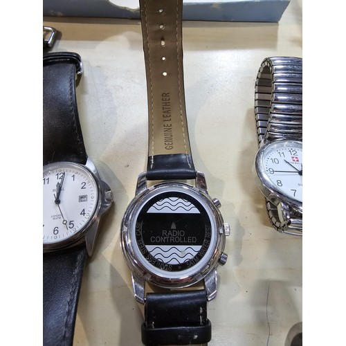 245 - A collection of 10 various watches and 12 travel clocks to include a good quality horseshoe formed t... 