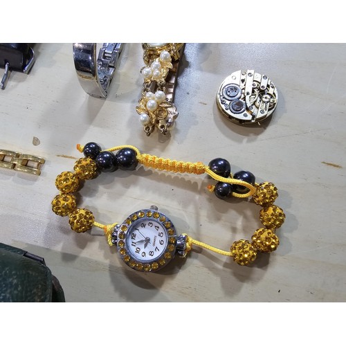 245 - A collection of 10 various watches and 12 travel clocks to include a good quality horseshoe formed t... 