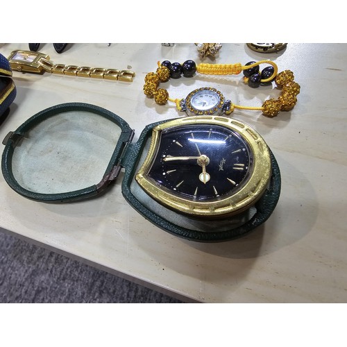 245 - A collection of 10 various watches and 12 travel clocks to include a good quality horseshoe formed t... 