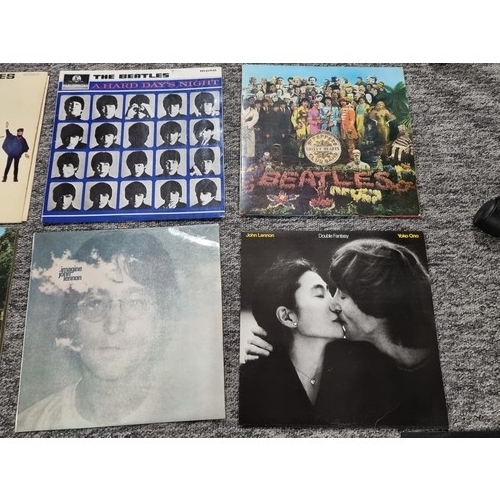 54 - A Qty of The Beatles and The Beatles related LP vinyl records and 45s. The Sgt. Pepper's Lonely Hear... 