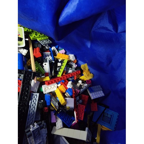 68 - Very large qty of mostly Lego and similar items complete in large blue soft bag with pull cord.