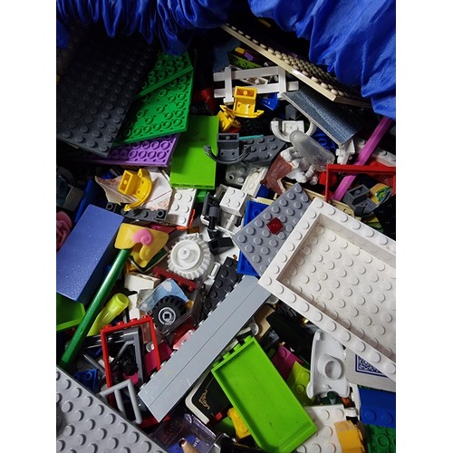 68 - Very large qty of mostly Lego and similar items complete in large blue soft bag with pull cord.