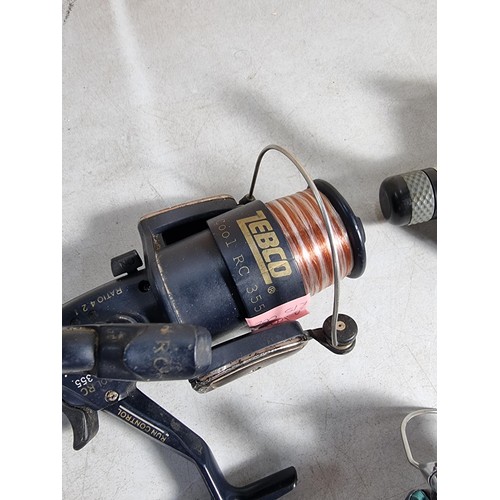 44 - Qty of 3x fishing reels - Fisheagle Spitfire HR4000, ZEBCO Cool RC 355 & Shakespeare BLUE rear drag ... 