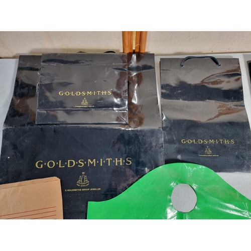 119 - Collection of collectable carrier bags to include one by Pryce Jones, Spar, Goldsmiths Group Jewelle... 