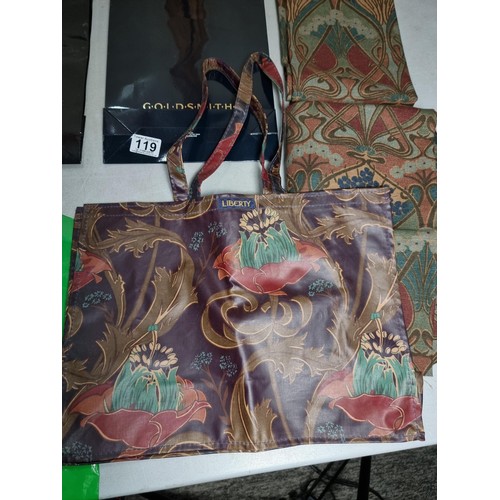 119 - Collection of collectable carrier bags to include one by Pryce Jones, Spar, Goldsmiths Group Jewelle... 