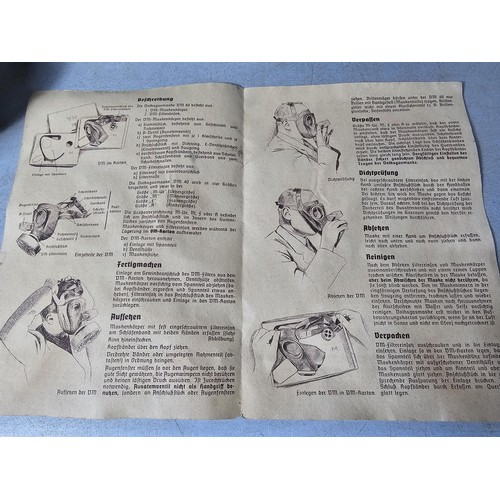 276 - Boxed vintage German WWII ladies gas mask VM F, RL1 39/86, complete with instruction leaflet, made b... 