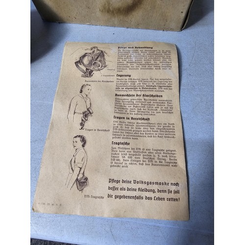 276 - Boxed vintage German WWII ladies gas mask VM F, RL1 39/86, complete with instruction leaflet, made b... 