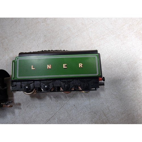 31 - Hornby R2261 Flying Scotsman LNER 4472 Locomotive and Corridor Tender with three matching LNER Teak ... 