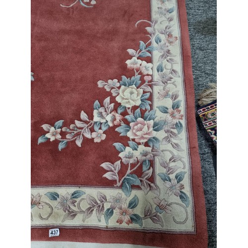 437 - Good quality thick floral hand made rug 100% pure wool pile in a deep coral/ cream colour. Handmade ... 