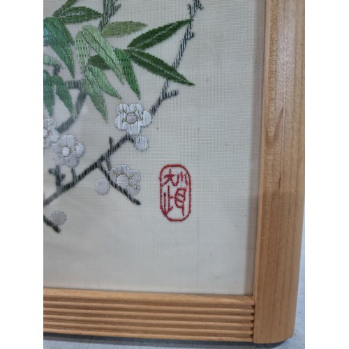 25 - Framed & glazed antique oriental silk hand embroidered of a bird on a Prunus tree, hand signed, heig... 